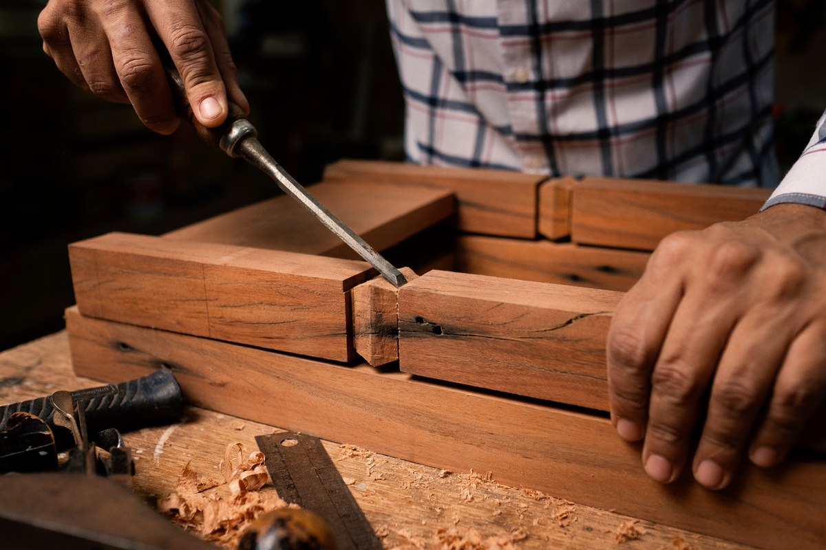A Person using a Chisel